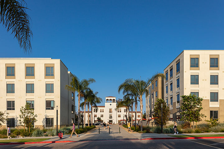 A view of the entryway to Palm North and South from across the road