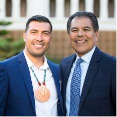 two latinx faculty standing next to eachother