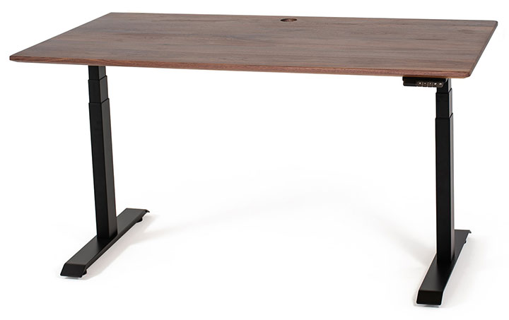 A height adjustable desk with metal legs and a wooden surface