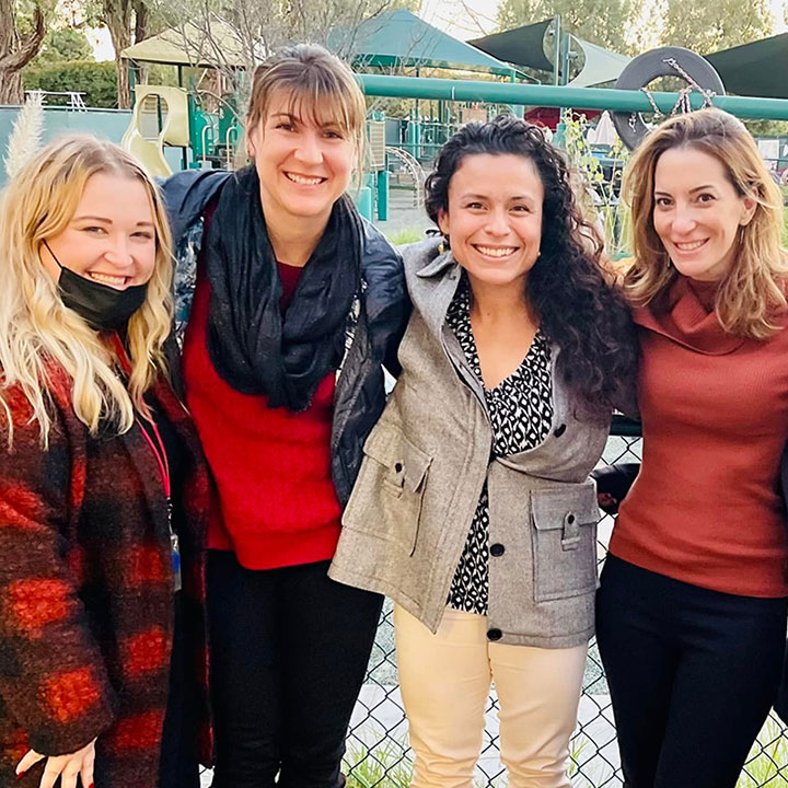 Several smiling Childrens Center staff